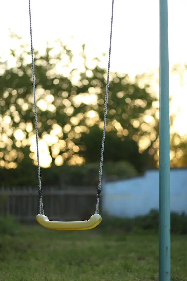 Backyard Swing Set, yellow plastic and chain